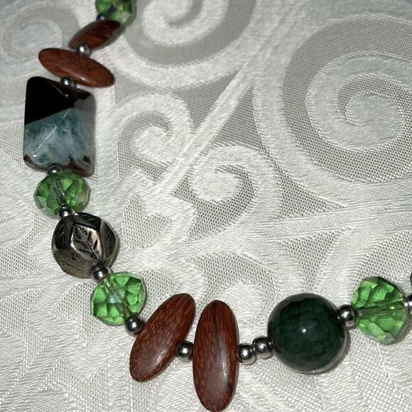 Asymmetrical bead necklace unique beads in green, blue, black, brown, & silver - Picture 6 of 7